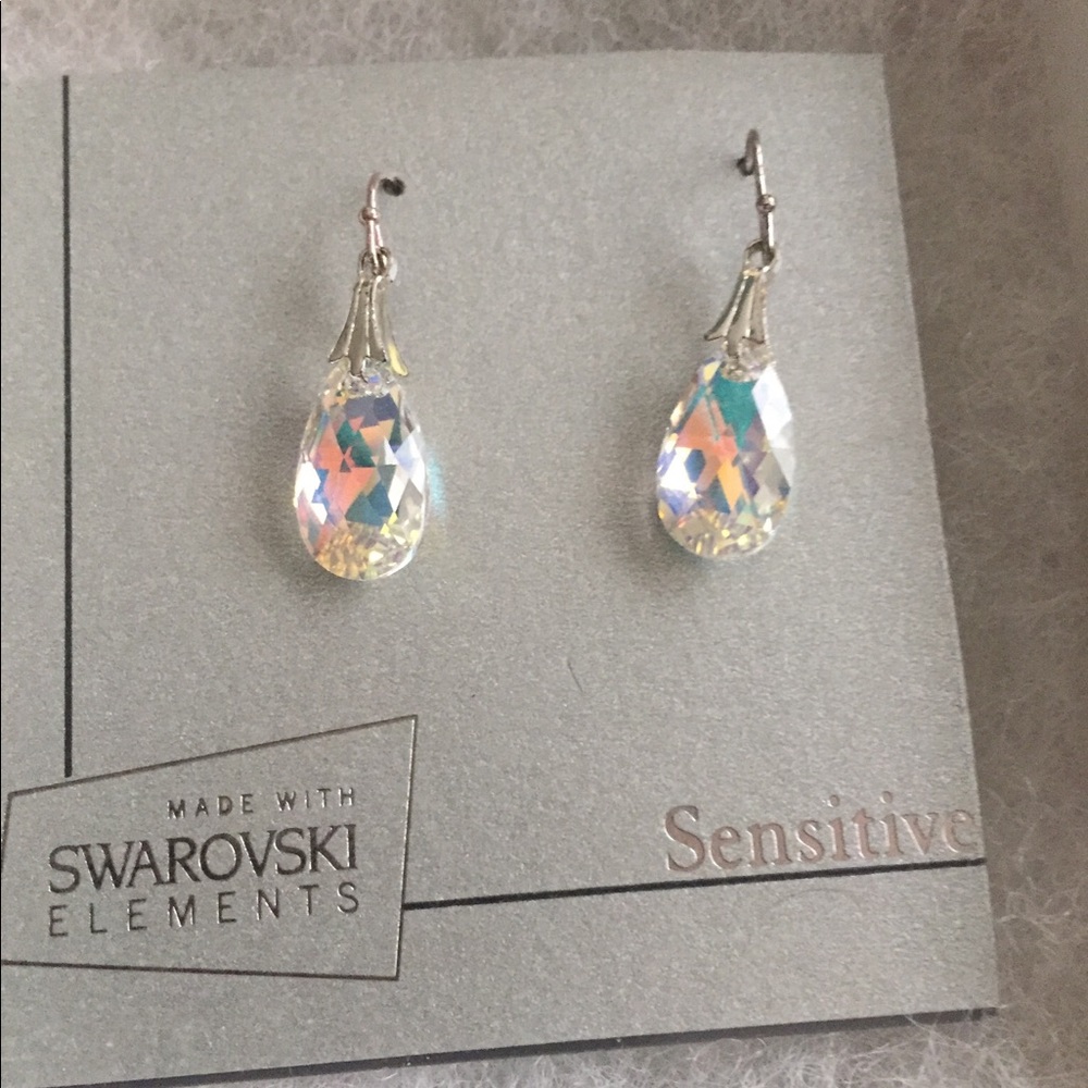 Swarovski earrings. Me wearing yellow green top.